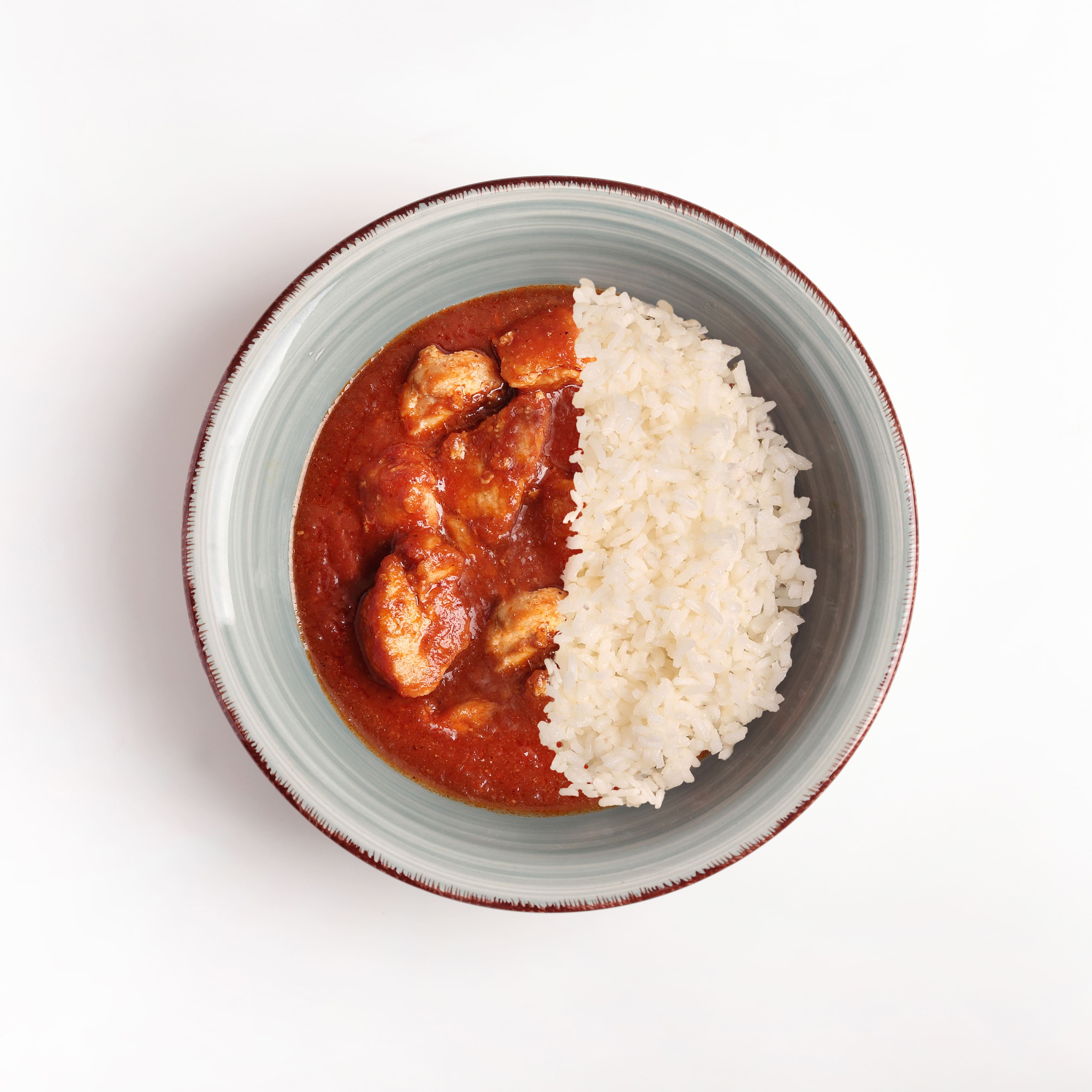 Nuestro pollo al curry de madrás + arroz